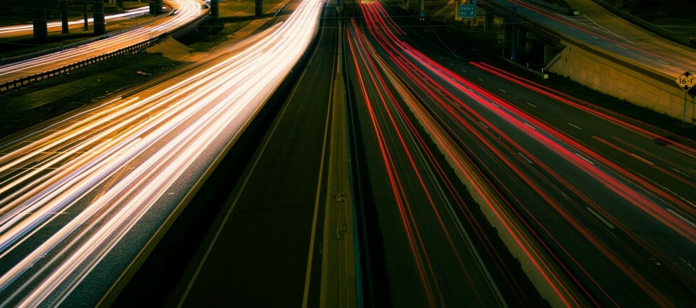 a vehicular highway at night, representing an image of the internet super highway.